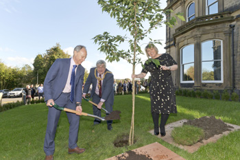 Paul Shevlin, Chief Executive of Craven District Council plants a tree to commemorate the opening with Peter Corkindale, Mayor of nearby Keighley and Lisa Gardner, Service Director at Malsis Hall.